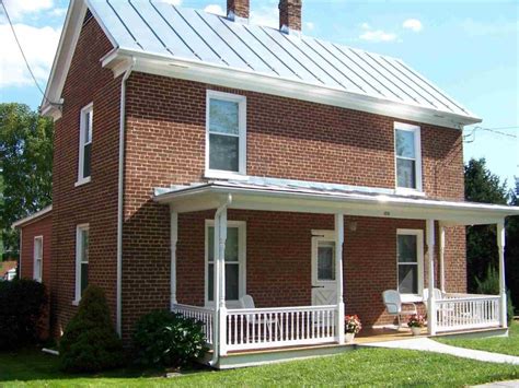 red brick houses with metal roofs|brick homes with metal roofs.